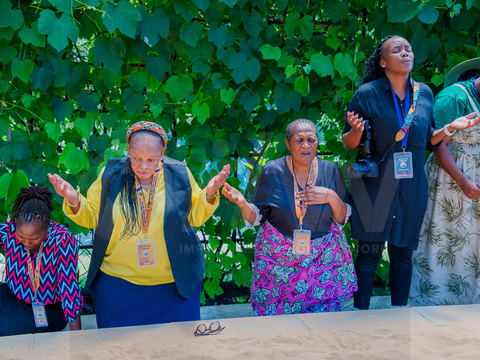 Participants praying together